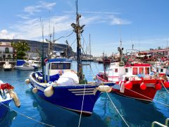 Puerto,De,Mogan,,Gran,Canaria,,Marina,With,Colorful-trimmed,Houses,