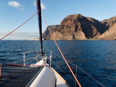 The,White,Bow,And,Furled,Sail,Of,A,Sailing,Yacht